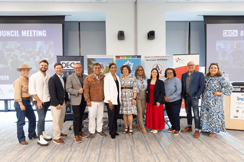 Group of diverse professionals at Austin LGBT Chamber event.